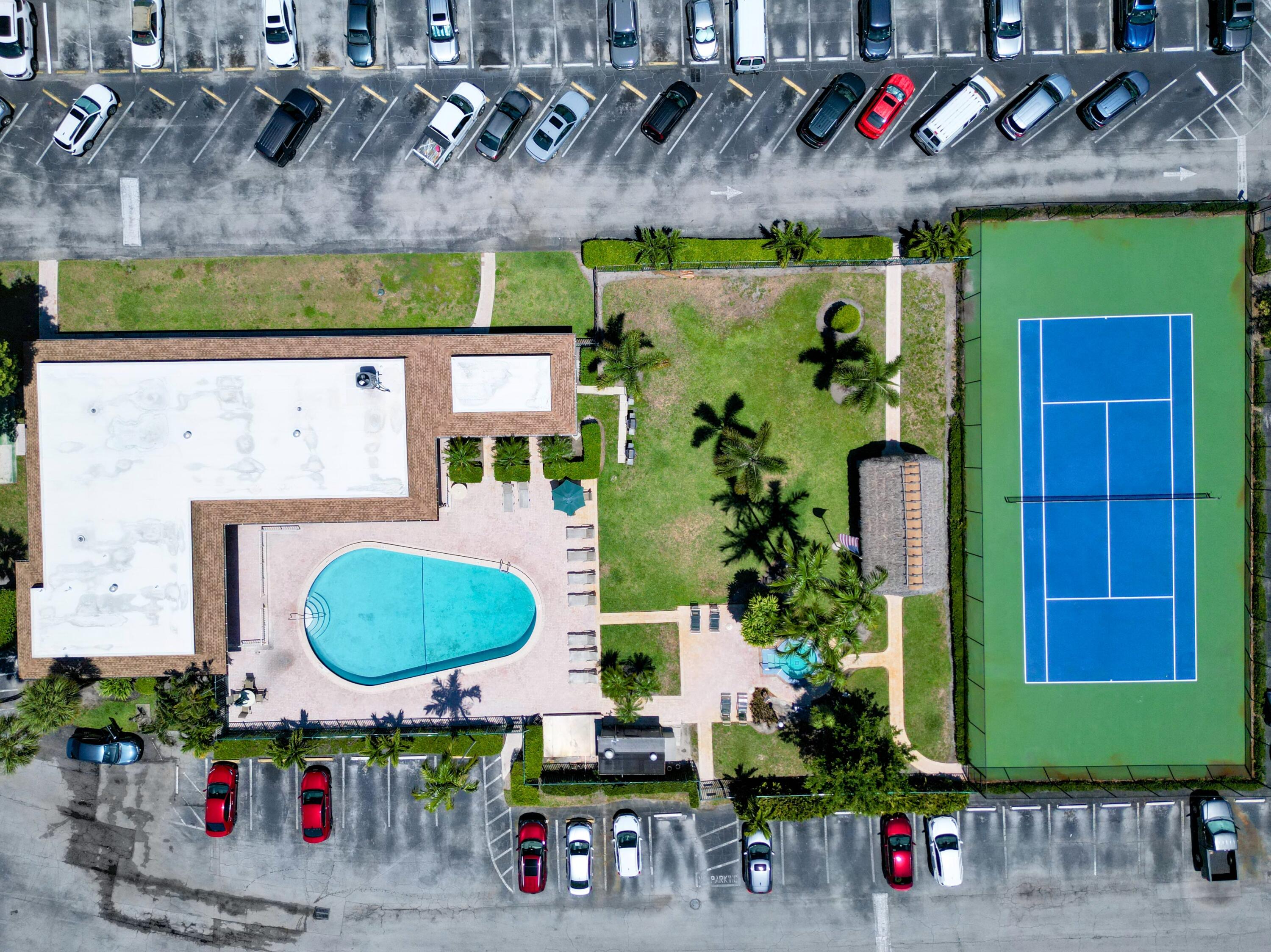 2430 Southwest 81st Avenue, Unit 108 Davie, FL 33324 - Photo 12 of 18 an outdoor living area with stove and a fireplace