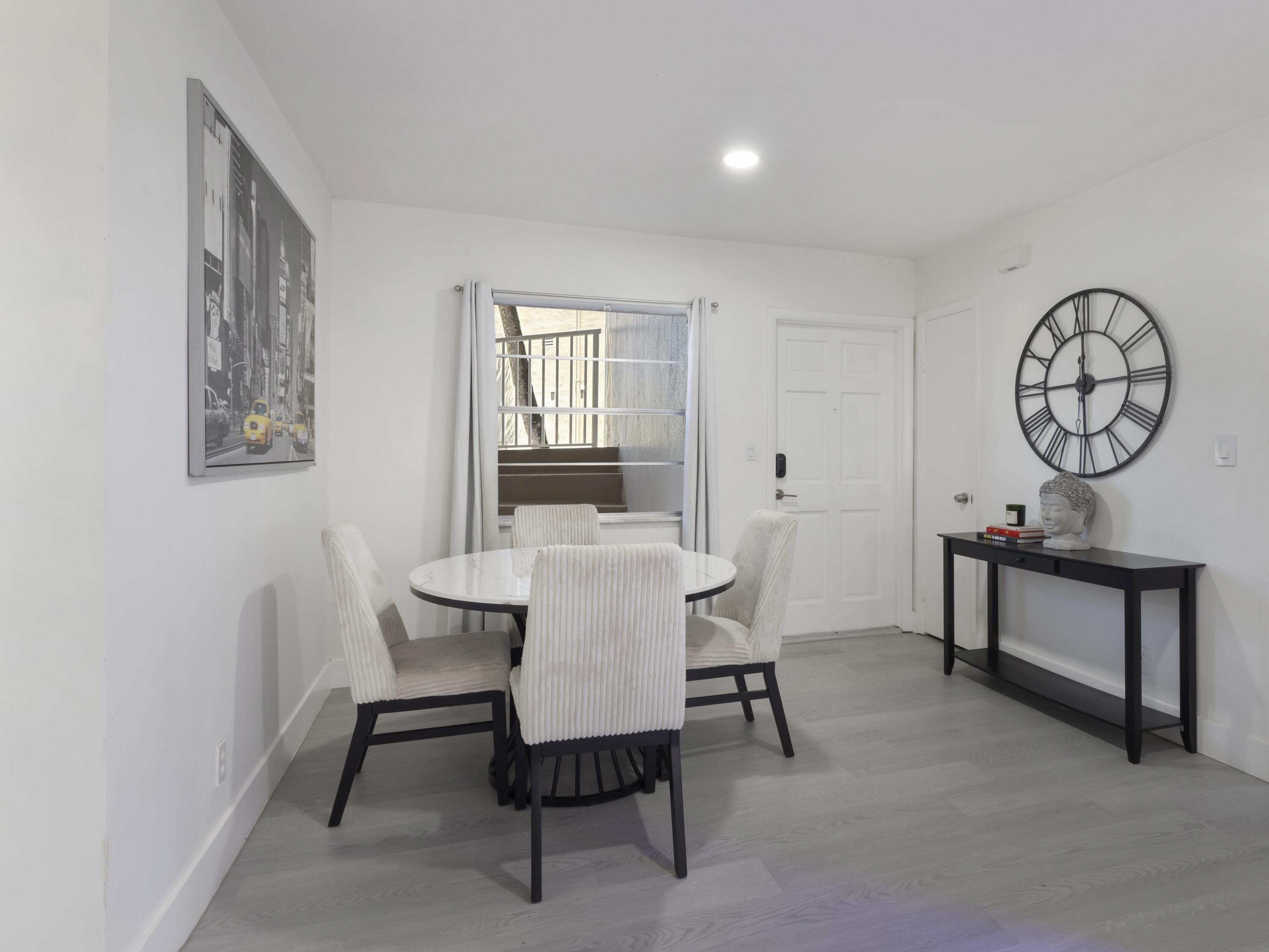 2430 Southwest 81st Avenue, Unit 108 Davie, FL 33324 - Photo 6 of 18 a view of a livingroom with furniture and a table