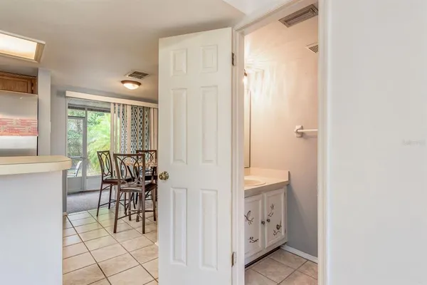 a bathroom with a sink and mirror
