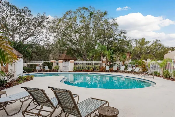 a view of a street with sitting area