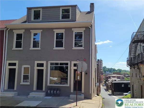 a view of a house with a porch
