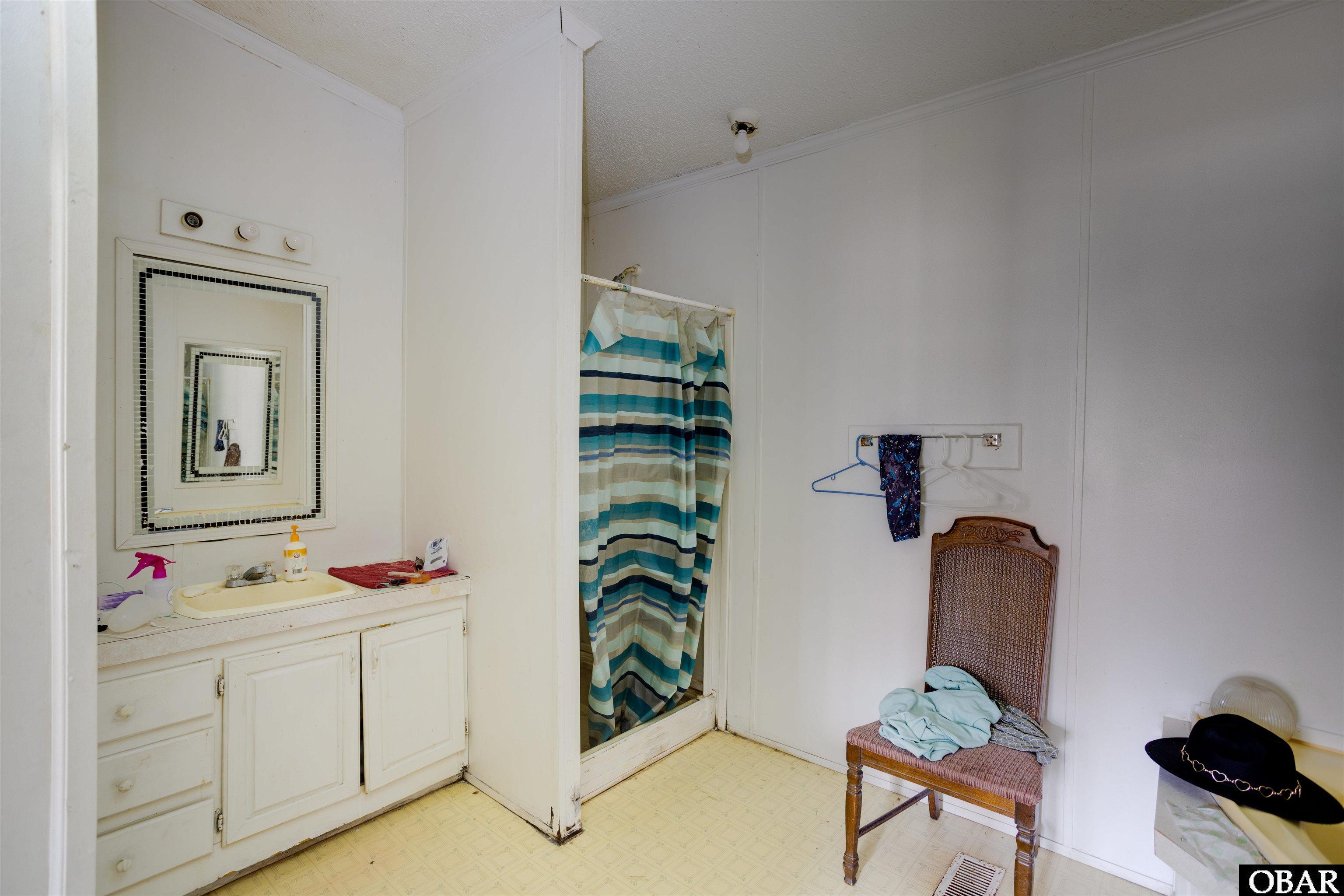 499 Green Hill Road Engelhard, NC 27824 - Photo 16 of 30 Doublewide Bathroom 1