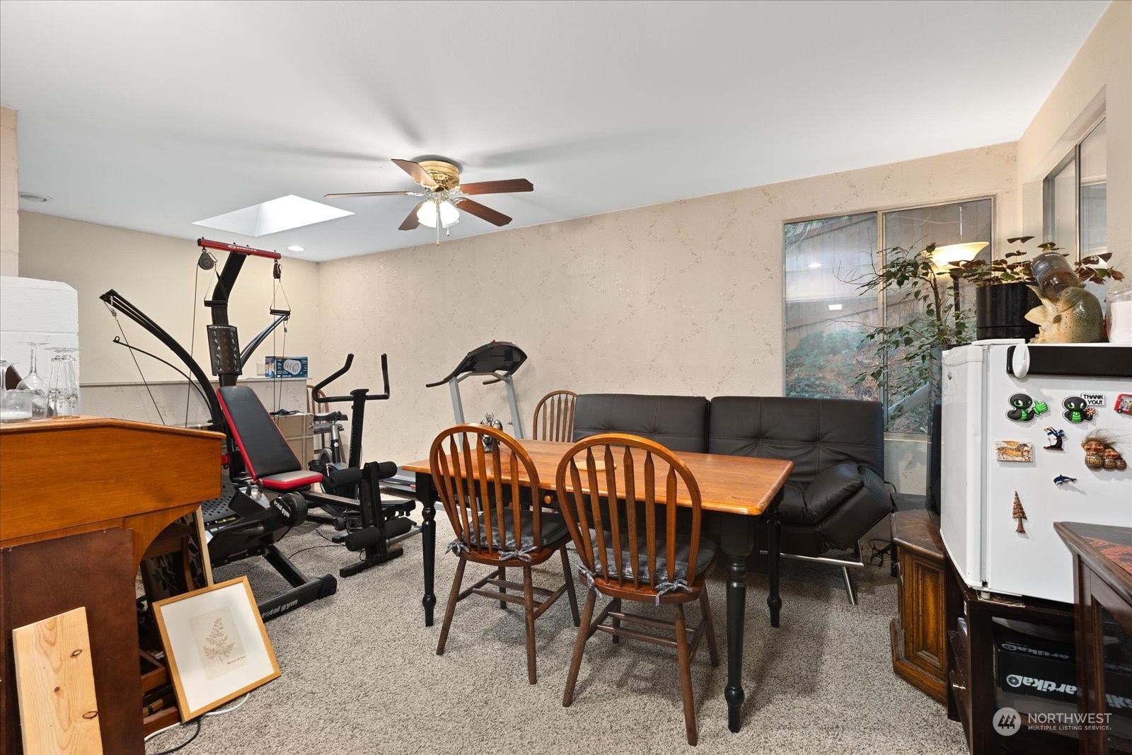 107 219th Place Southeast Bothell, WA 98021 - Photo 22 of 40 a view of a dining room with furniture and chandelier