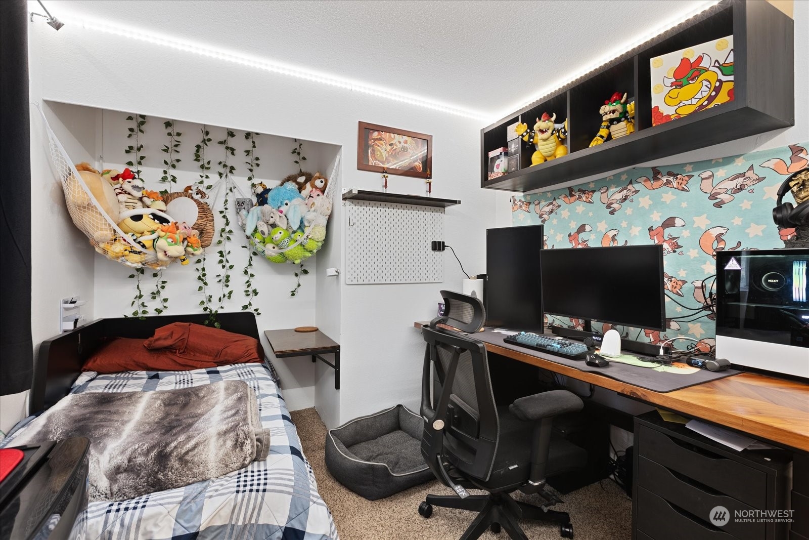 107 219th Place Southeast Bothell, WA 98021 - Photo 29 of 40 a view of a workspace with furniture and computer on a desk