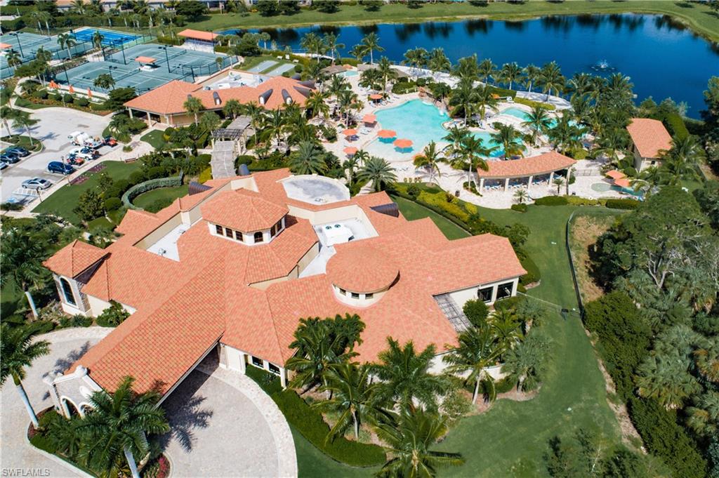 9735 Acqua Court, Unit 622 Naples, FL 34113 - Photo 24 of 34 an aerial view of a house with a lake view