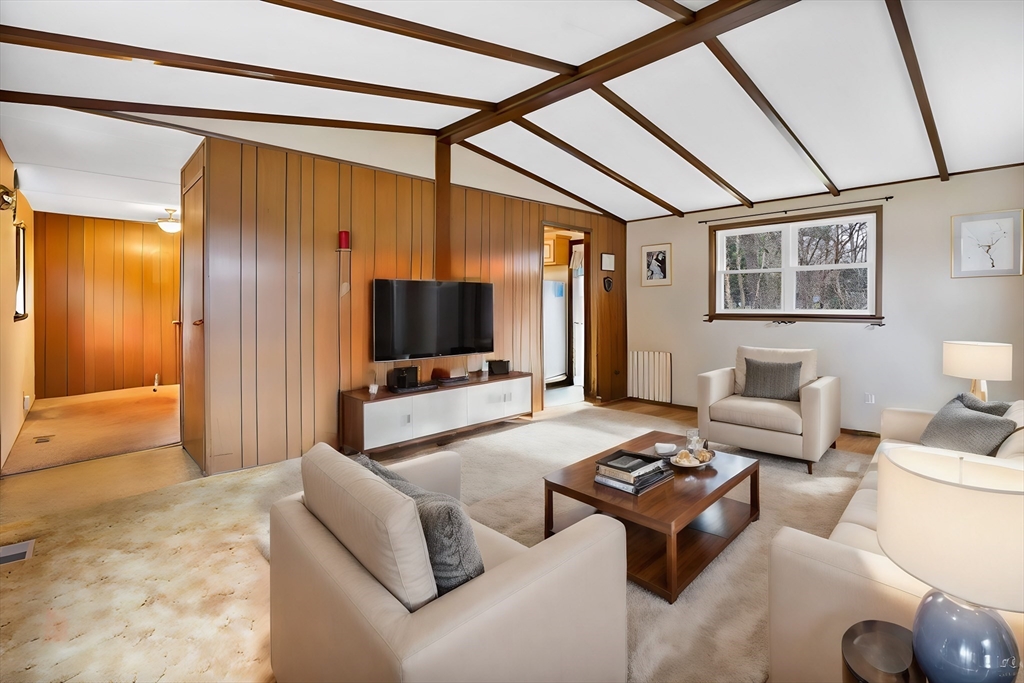 37 Ruthven Street Springfield, MA 01128 - Photo 12 of 24 a living room with furniture and a flat screen tv