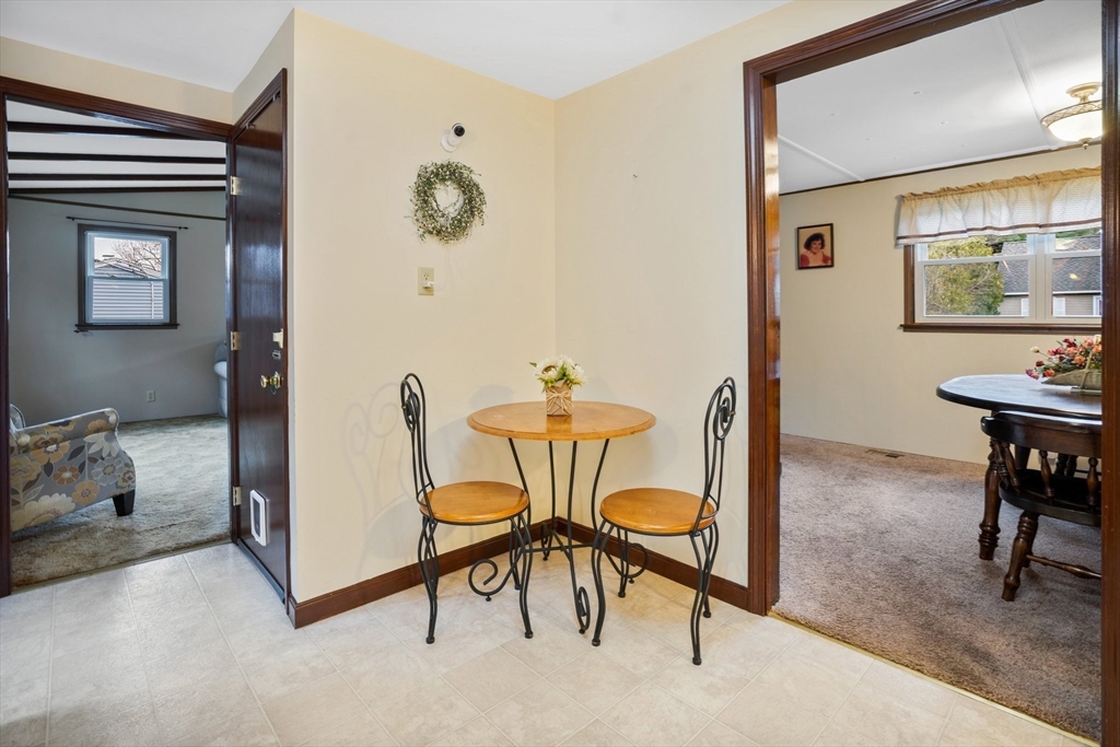 37 Ruthven Street Springfield, MA 01128 - Photo 14 of 24 a view of a livingroom with furniture and window