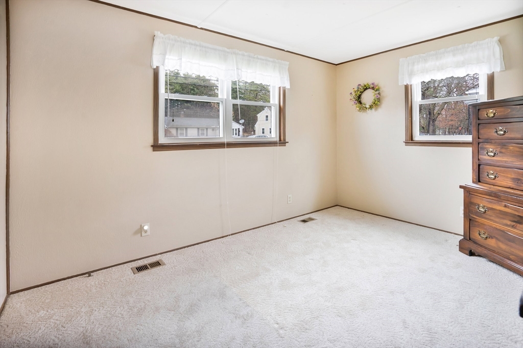 37 Ruthven Street Springfield, MA 01128 - Photo 15 of 24 a view of an empty room with a window