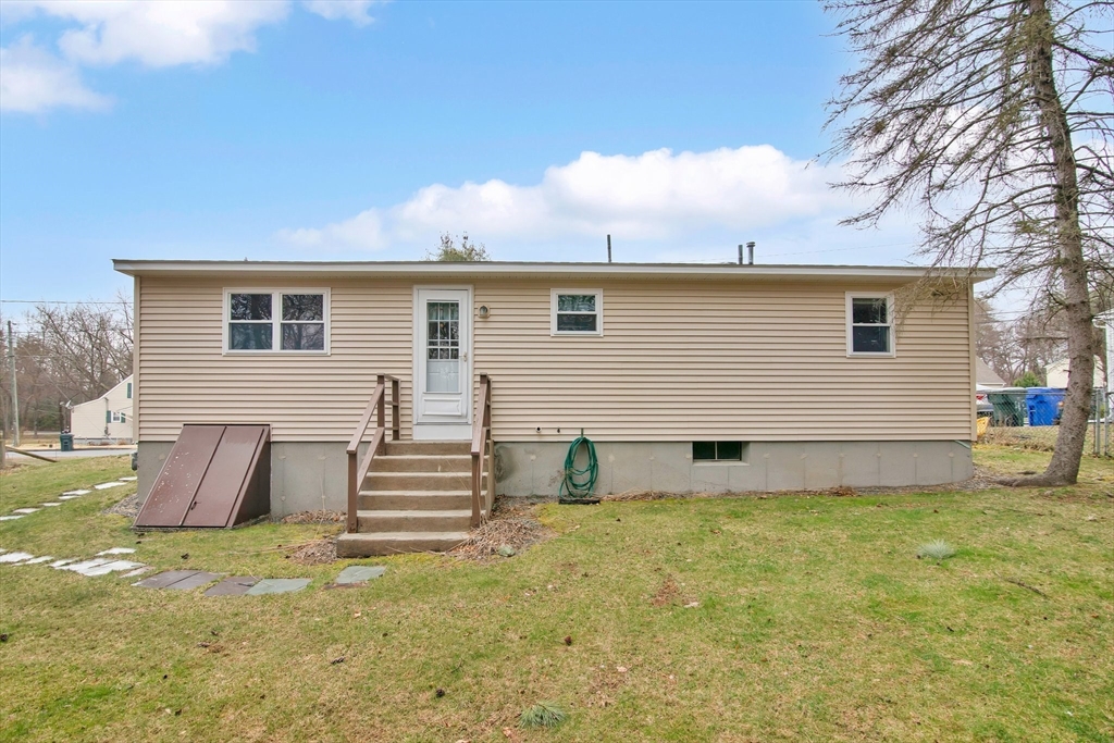 37 Ruthven Street Springfield, MA 01128 - Photo 2 of 24 a view of a house with a yard