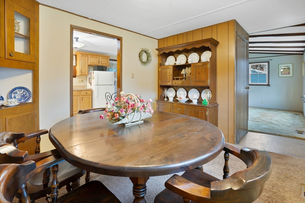 37 Ruthven Street Springfield, MA 01128 - Photo 7 of 24 a view of a dining room with furniture and wooden floor