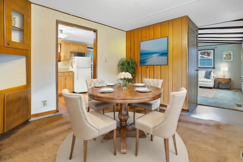 37 Ruthven Street Springfield, MA 01128 - Photo 8 of 24 a view of a dining room with furniture and wooden floor