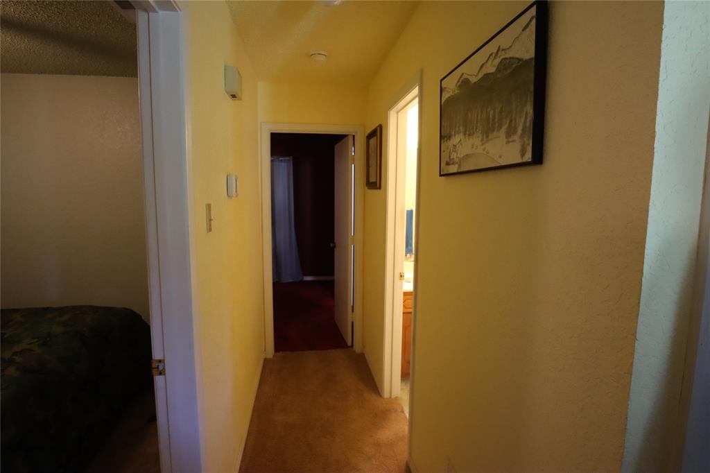 39 Oakcrest Drive Ranger, TX 76470 - Photo 25 of 25 a view of a hallway with wooden floor