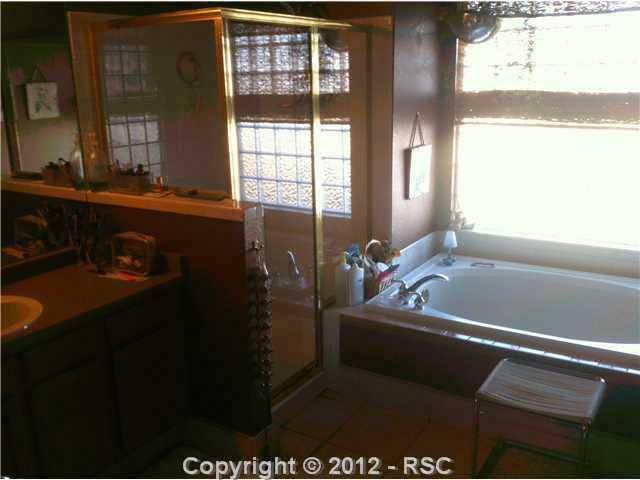 5630 Wilson Road Colorado Springs, CO 80919 - Photo 6 of 16 adjoining master bath