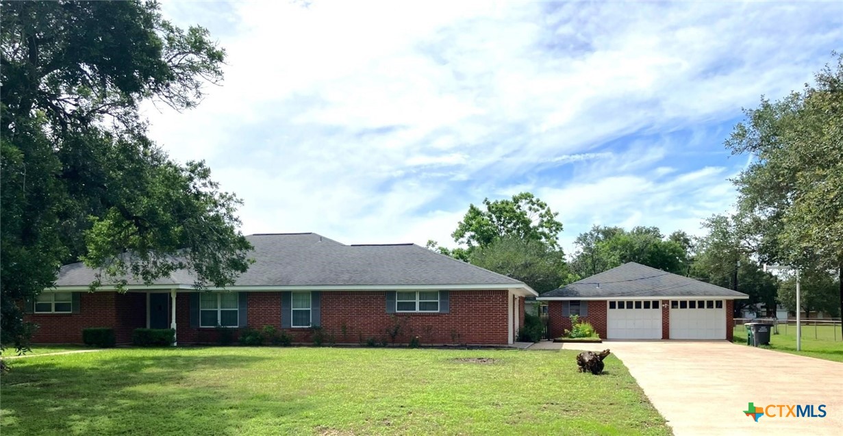 502 Cannon Road Victoria, TX 77904 - Photo 2 of 3 a front view of a house with a garden
