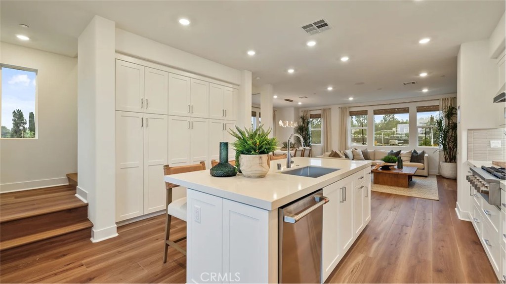 1829 Lychee Street Fullerton, CA 92833 - Photo 2 of 23 a kitchen with sink stove and refrigerator