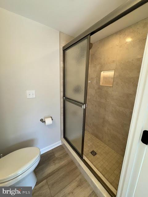 104 Stuart Avenue Downingtown, PA 19335 - Photo 12 of 30 a bathroom with a shower and a toilet