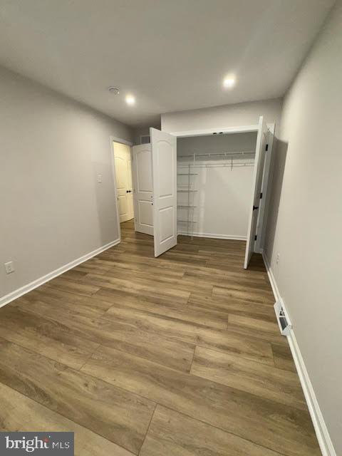 104 Stuart Avenue Downingtown, PA 19335 - Photo 21 of 30 a view of an empty room with wooden floor and closet