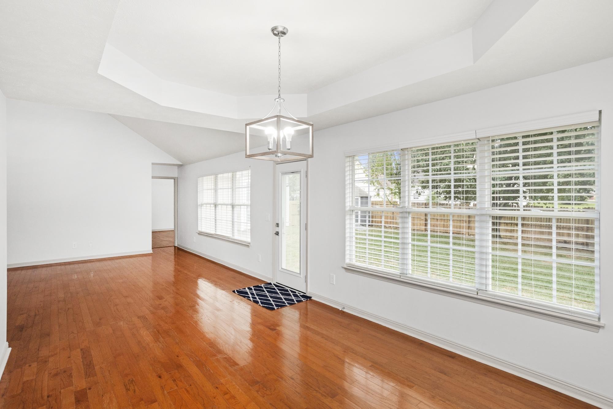 607 Mable Drive La Vergne, TN 37086 - Photo 11 of 46 a view of an empty room with wooden floor and a window