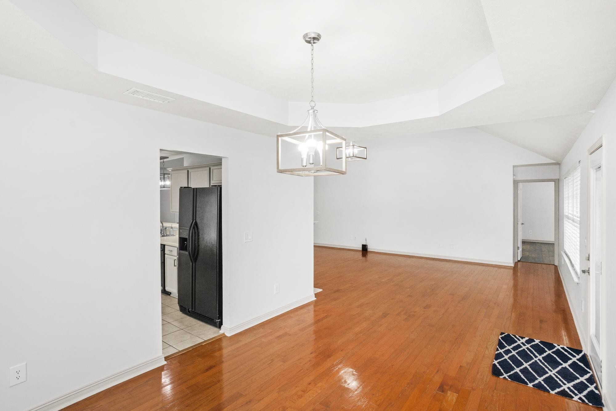 607 Mable Drive La Vergne, TN 37086 - Photo 12 of 46 a view of a room with wooden floor and white walls