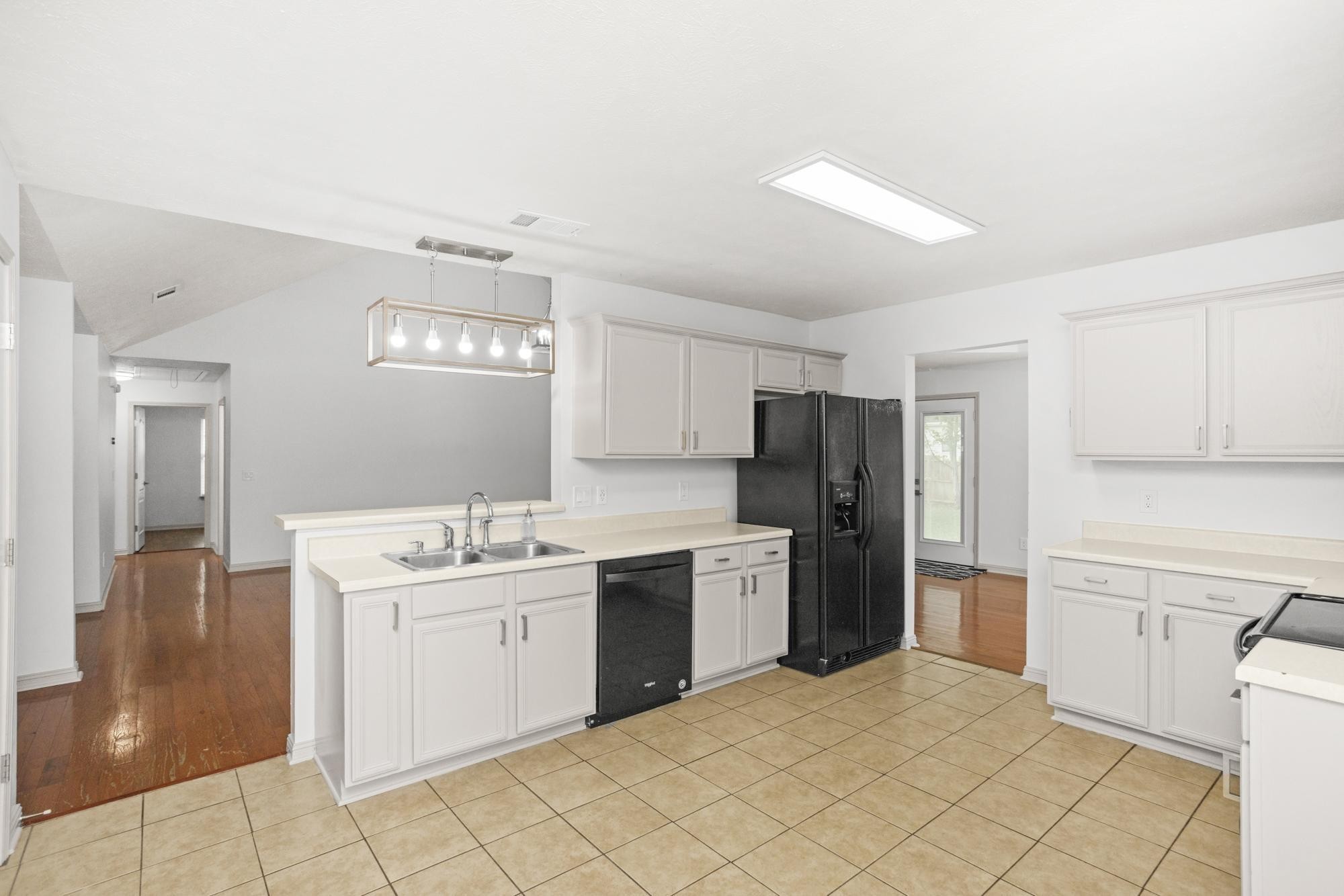 607 Mable Drive La Vergne, TN 37086 - Photo 14 of 46 a kitchen with a sink cabinets and refrigerator