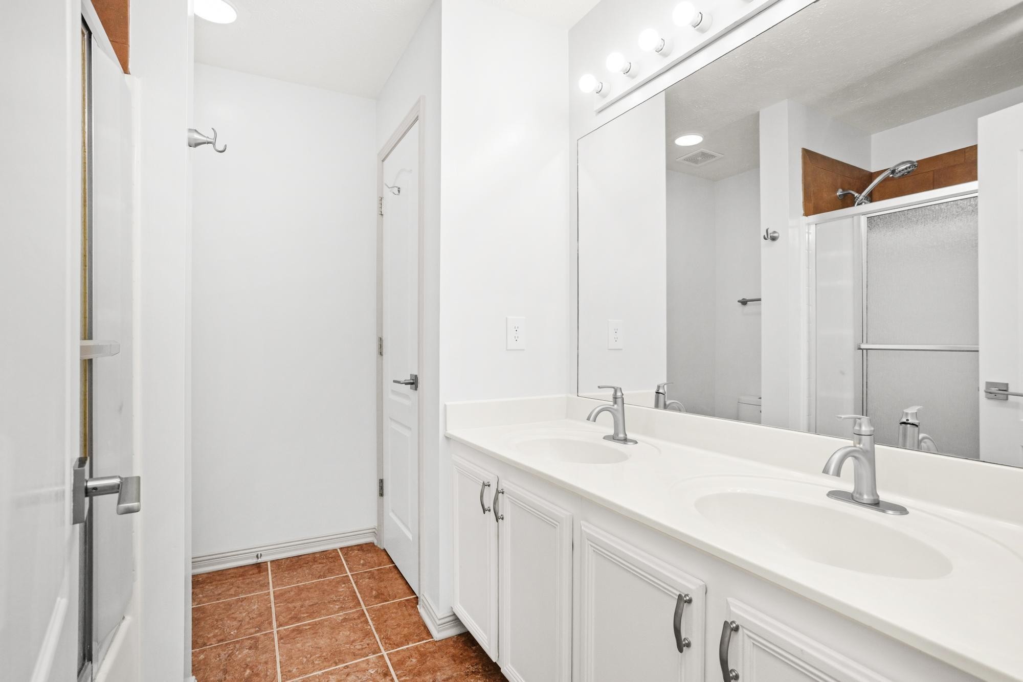 607 Mable Drive La Vergne, TN 37086 - Photo 21 of 46 a bathroom with a double vanity sink mirror and double
