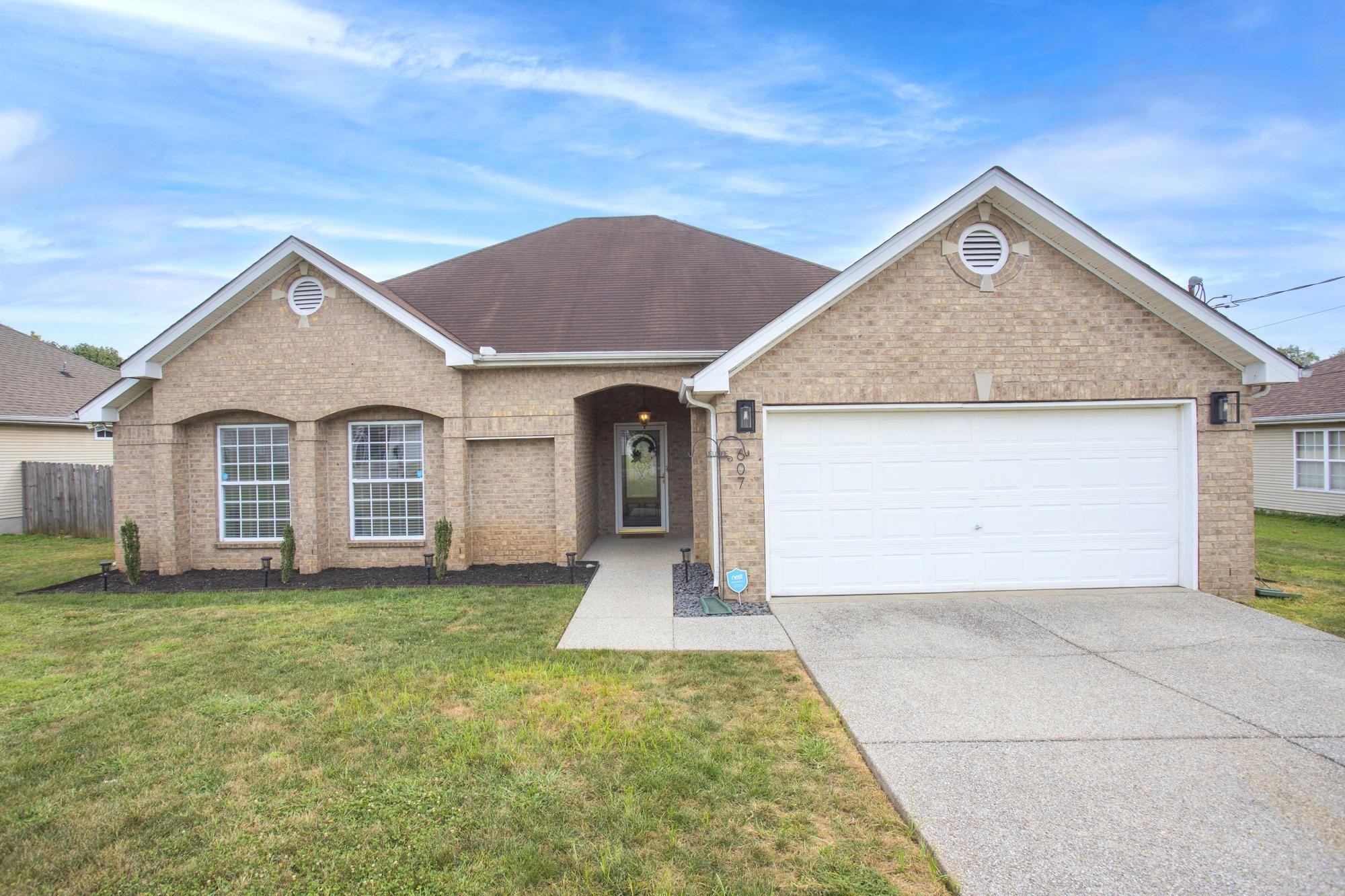 607 Mable Drive La Vergne, TN 37086 - Photo 3 of 46 a view of a house with a yard
