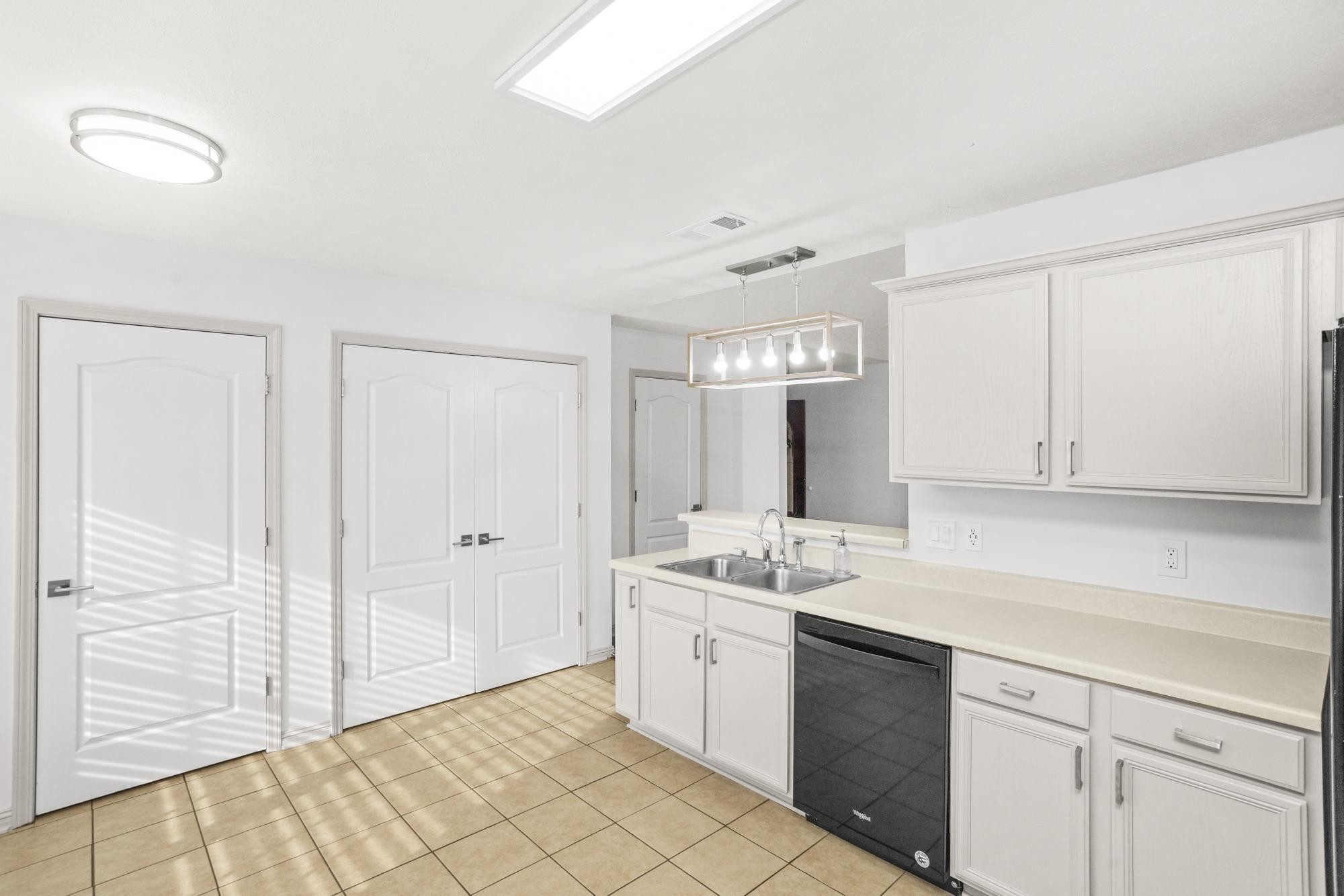 607 Mable Drive La Vergne, TN 37086 - Photo 32 of 46 a spacious bathroom with a sink and a mirror