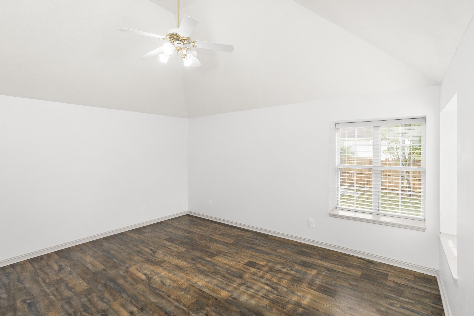 607 Mable Drive La Vergne, TN 37086 - Photo 34 of 46 wooden floor in an empty room with a window