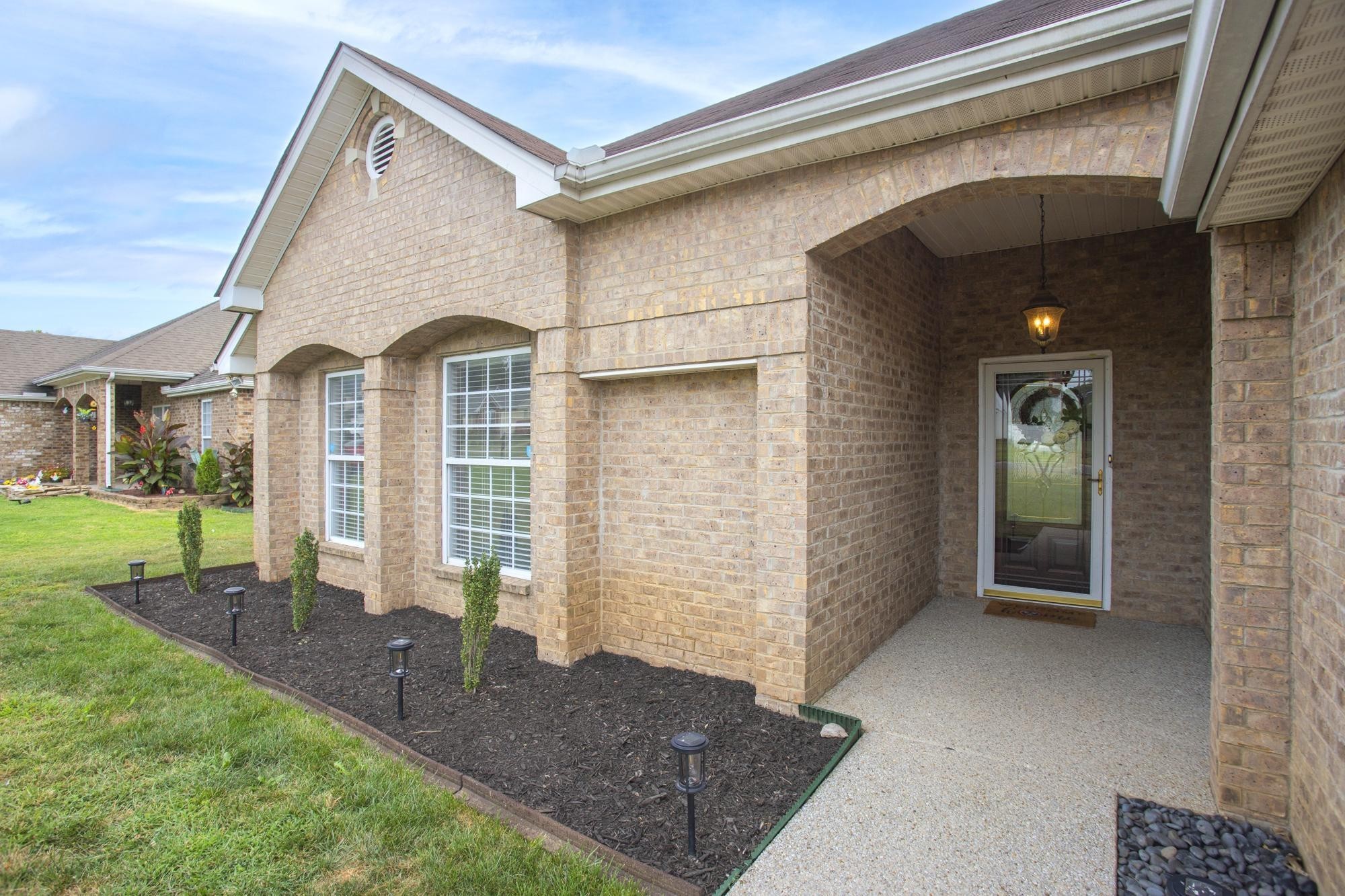 607 Mable Drive La Vergne, TN 37086 - Photo 4 of 46 a front view of a house with garden