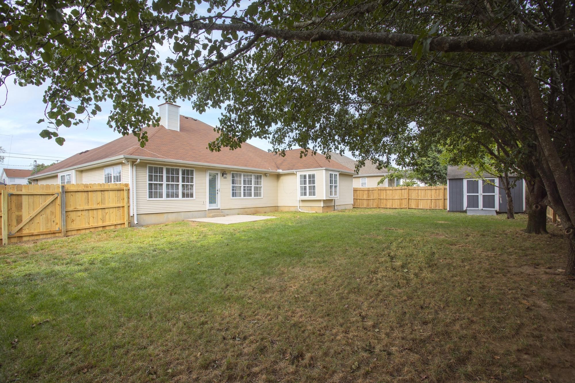 607 Mable Drive La Vergne, TN 37086 - Photo 46 of 46 a front view of a house with a garden