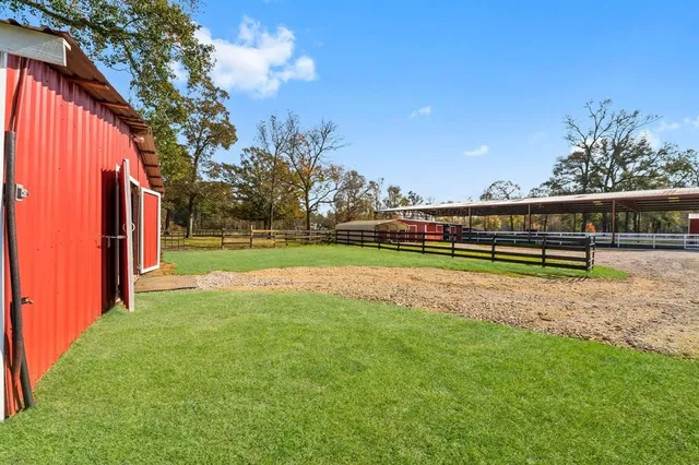 a view of a room with wooden walls