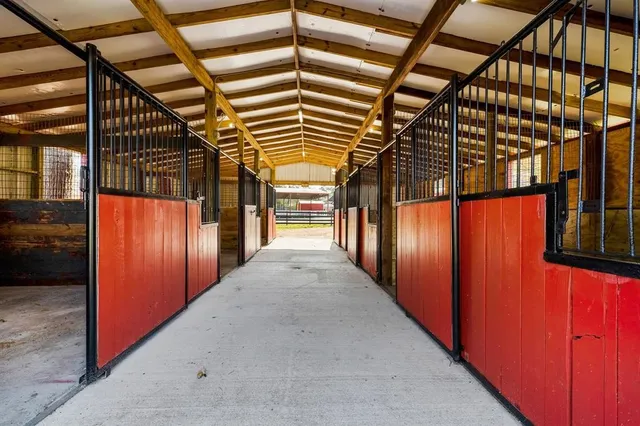 a view of a porch with wooden floor and outer view