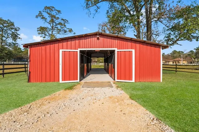 a front view of building with yard