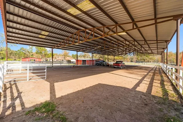 a view of a swimming pool with a patio