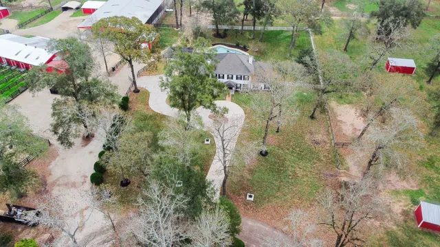 an aerial view of residential house with outdoor space