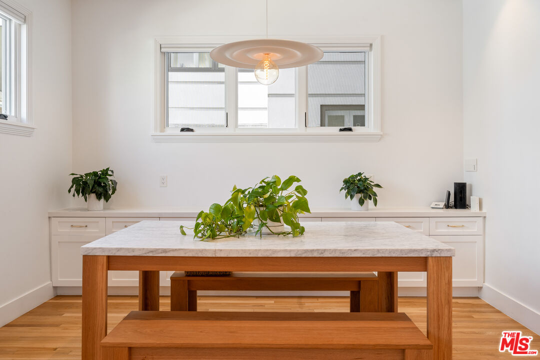 128 Roma Court Marina del Rey, CA 90292 - Photo 25 of 52 a close view of chair and potted plant