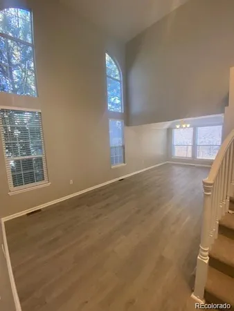 a view of an empty room and window