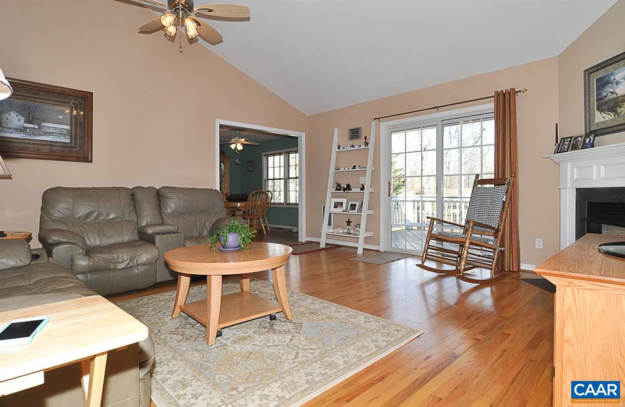 25 Oak Grove Road Palmyra, VA 22963 - Photo 13 of 28 a living room with furniture and a fireplace