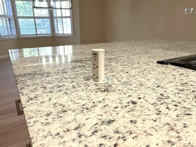 a kitchen with a sink stove and refrigerator