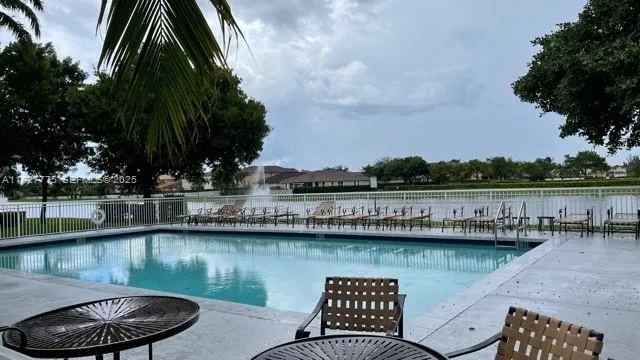 a view of swimming pool with a terrace