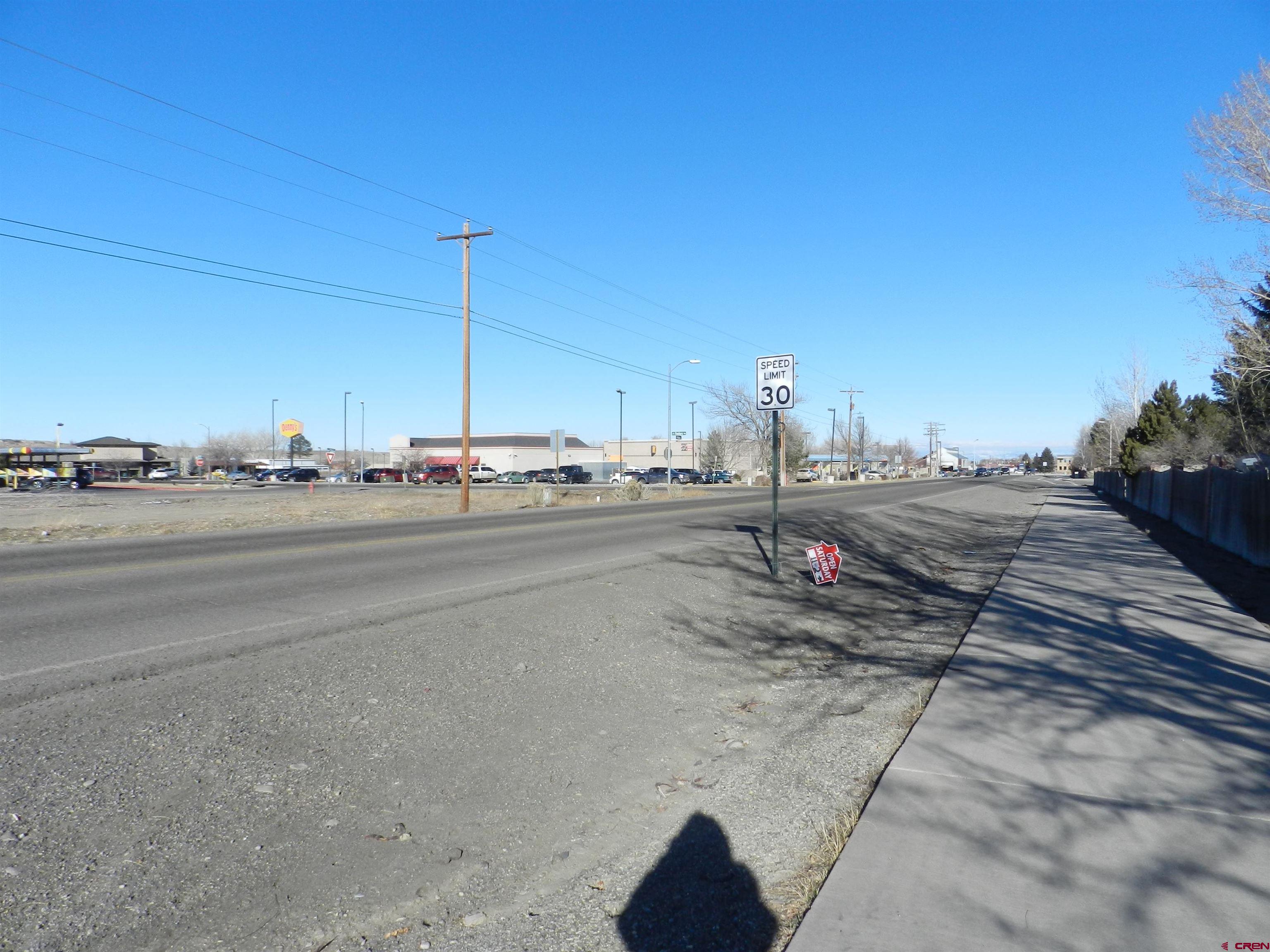 Tbd Woodgate Road Montrose, CO 81401 - Photo 11 of 20 a view of a street with houses