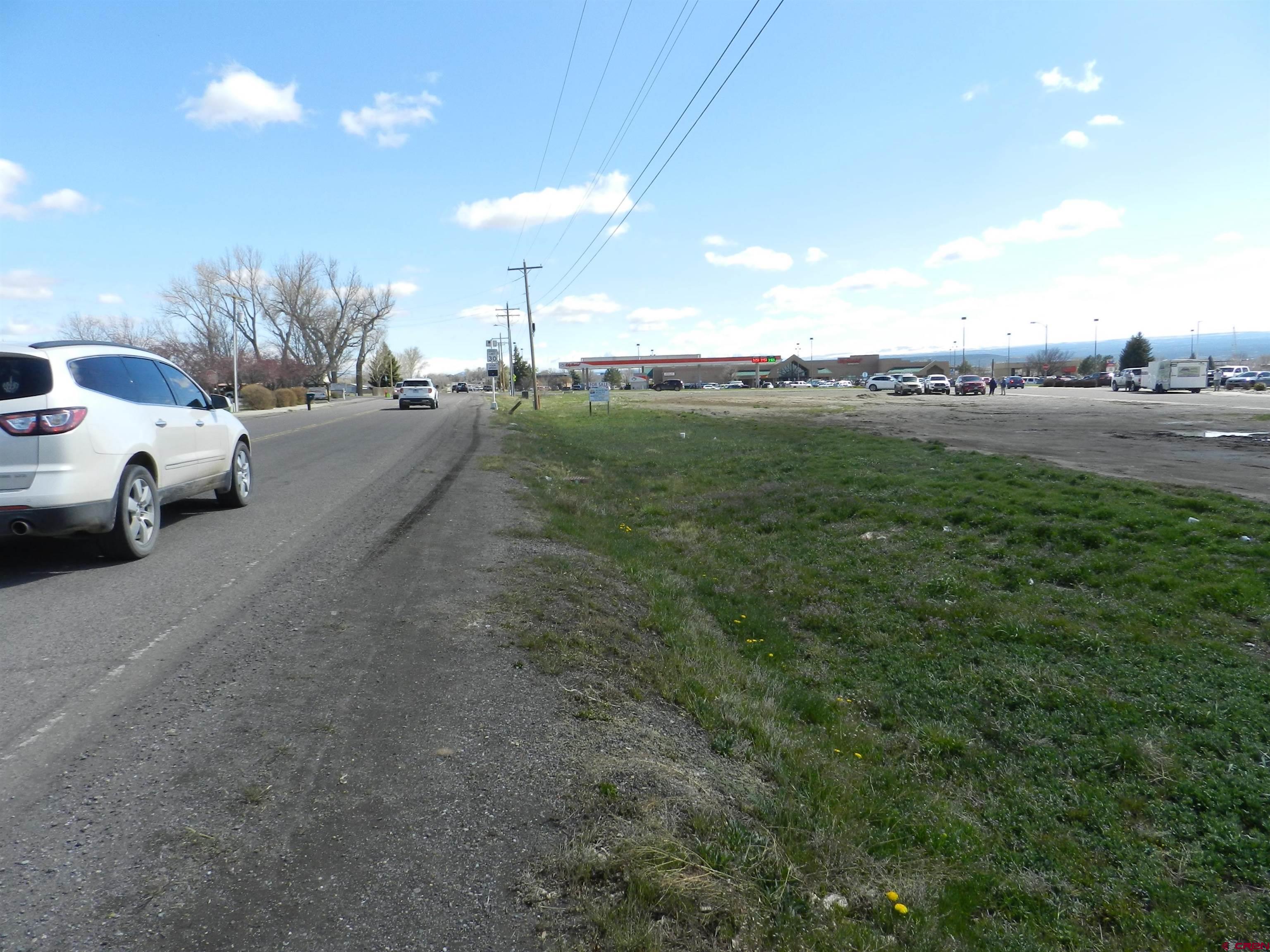 Tbd Woodgate Road Montrose, CO 81401 - Photo 5 of 20 a view of street with houses