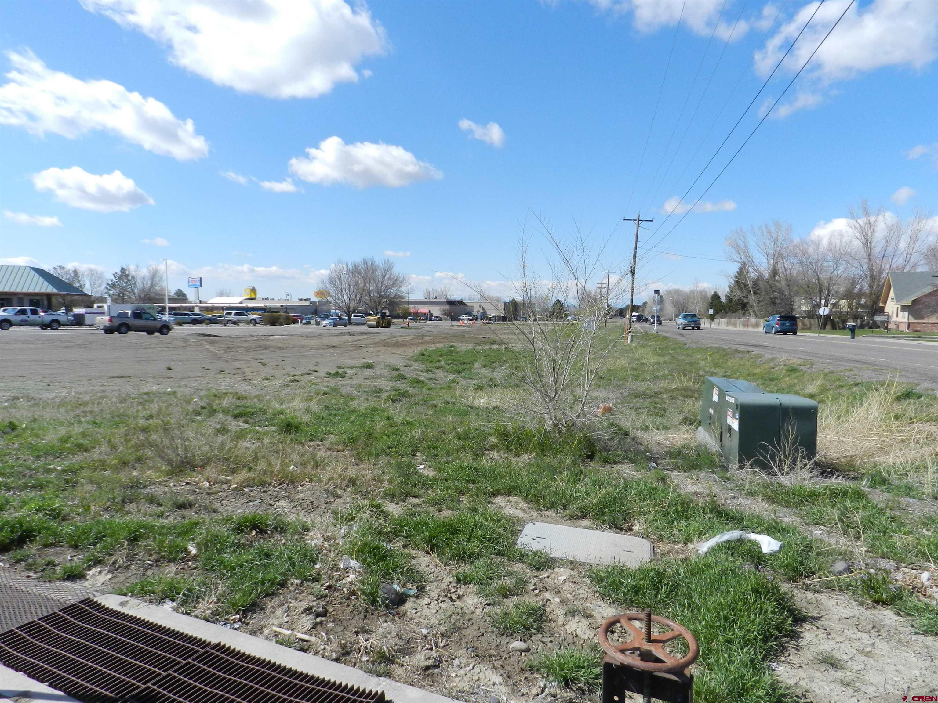 Tbd Woodgate Road Montrose, CO 81401 - Photo 9 of 20 a view of a yard and front view of a house
