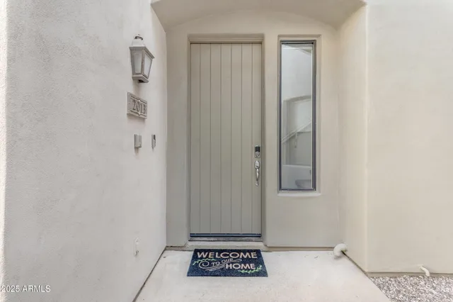 a view of a door and a window