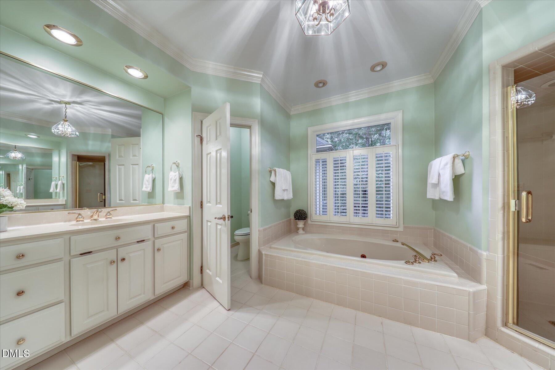 1904 Merion Place Raleigh, NC 27615 - Photo 19 of 43 Primary bathroom with separate dual vanities