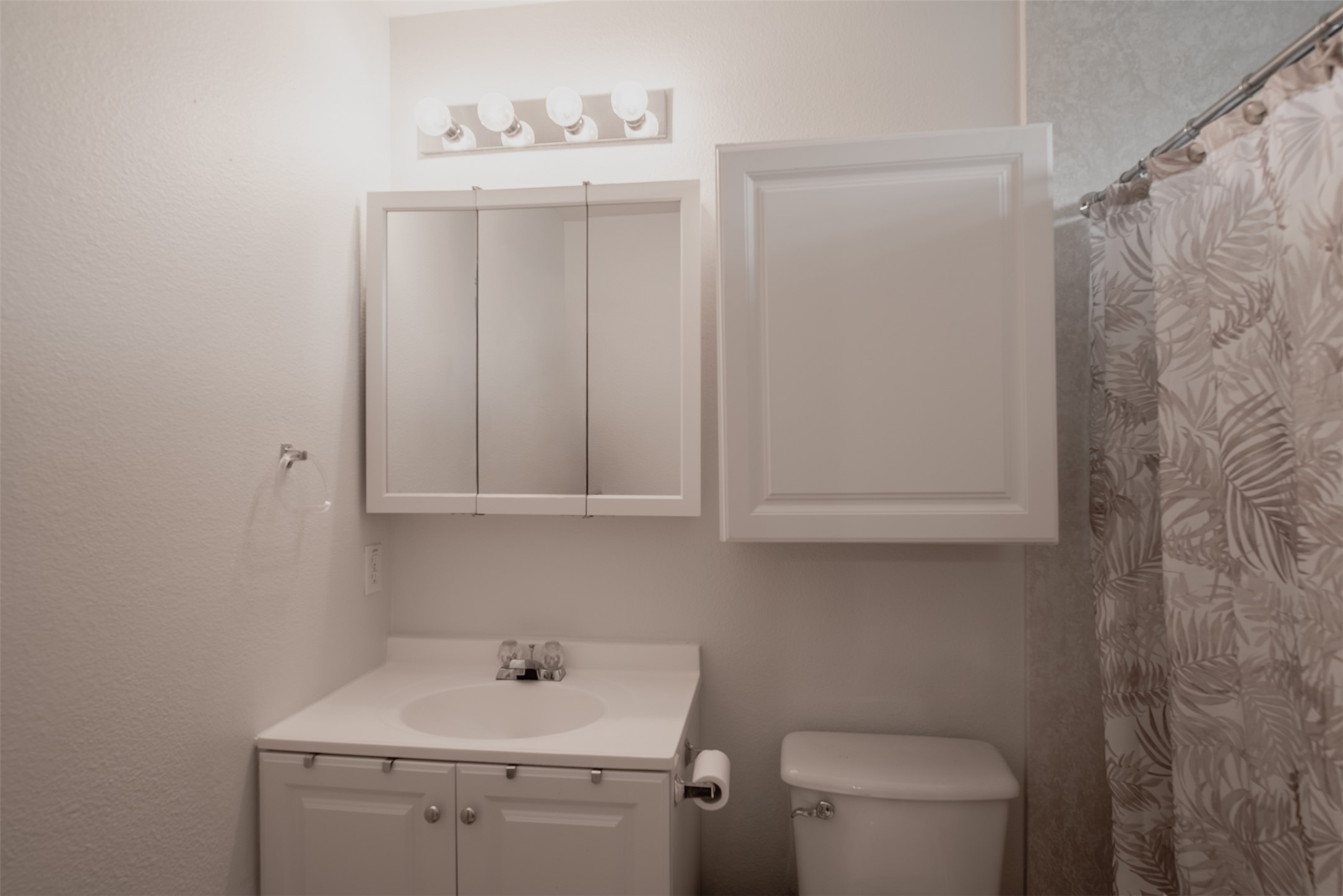 5501 English Avenue Austin, TX 78724 - Photo 11 of 19 a bathroom with a sink a toilet and vanity