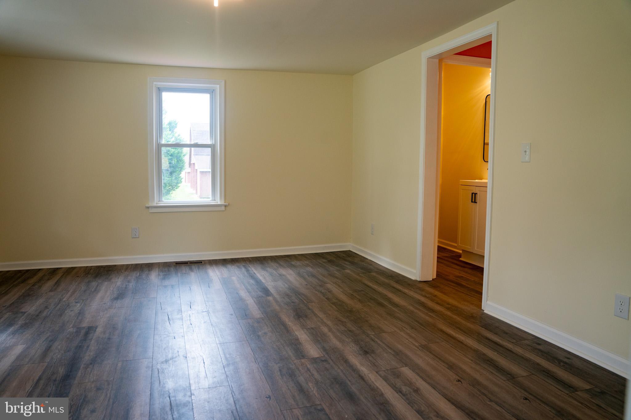 29592 Foskey Lane Delmar, MD 21875 - Photo 3 of 65 Bright, airy space with warm wood floors.