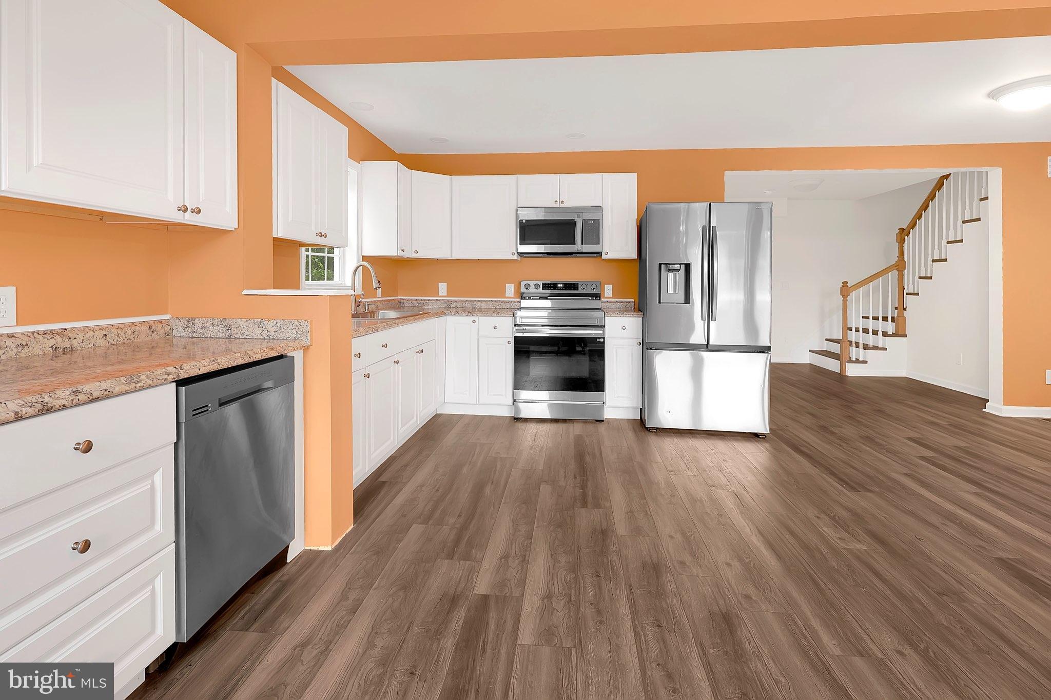 29592 Foskey Lane Delmar, MD 21875 - Photo 45 of 65 Bright and modern kitchen with warm accents.