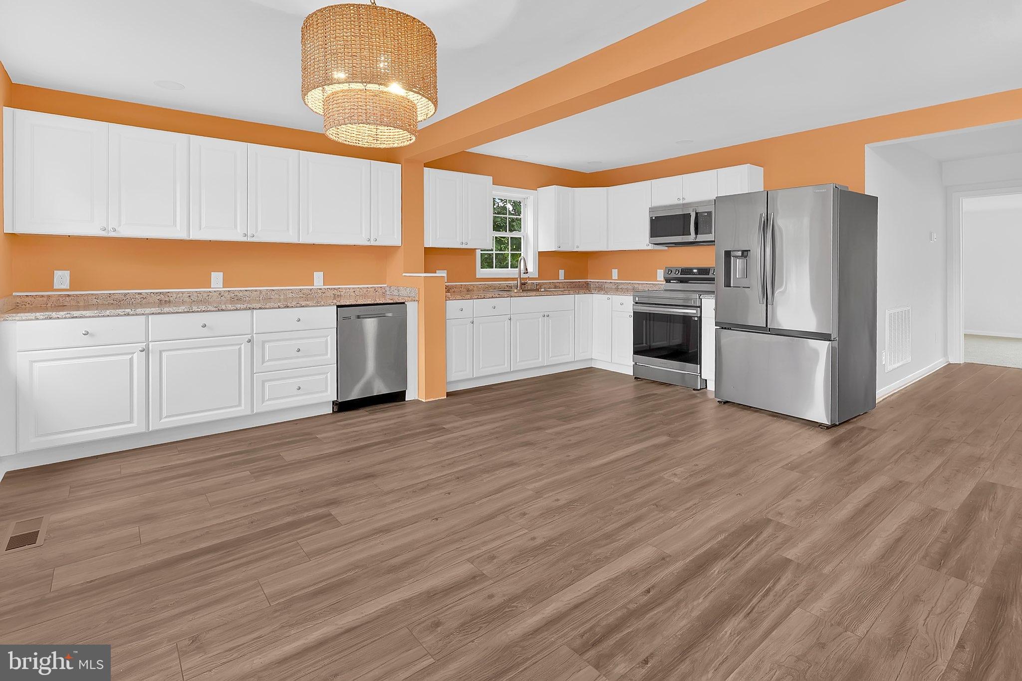 29592 Foskey Lane Delmar, MD 21875 - Photo 47 of 65 Bright and modern kitchen with vibrant accents.
