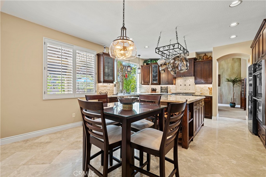 25221 Summerhill Lane Stevenson Ranch, CA 91381 - Photo 19 of 74 a view of a dining room and livingroom view